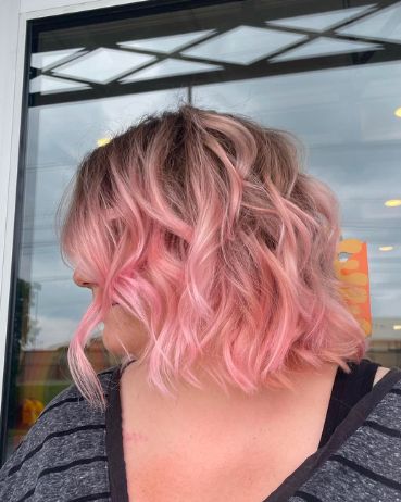 Client with a pastel pink wavy bob